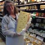 Catherine and a big wedge of cheese